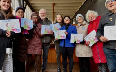 Voices in Motion choristers serenade local little free library